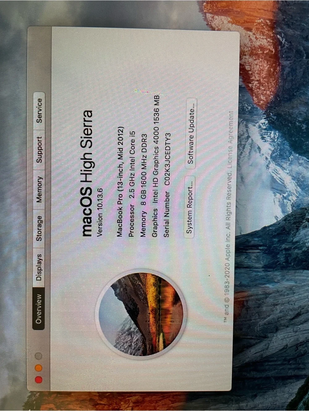 Apple MacBook Pro Silver with Black Keyboard and Sticker